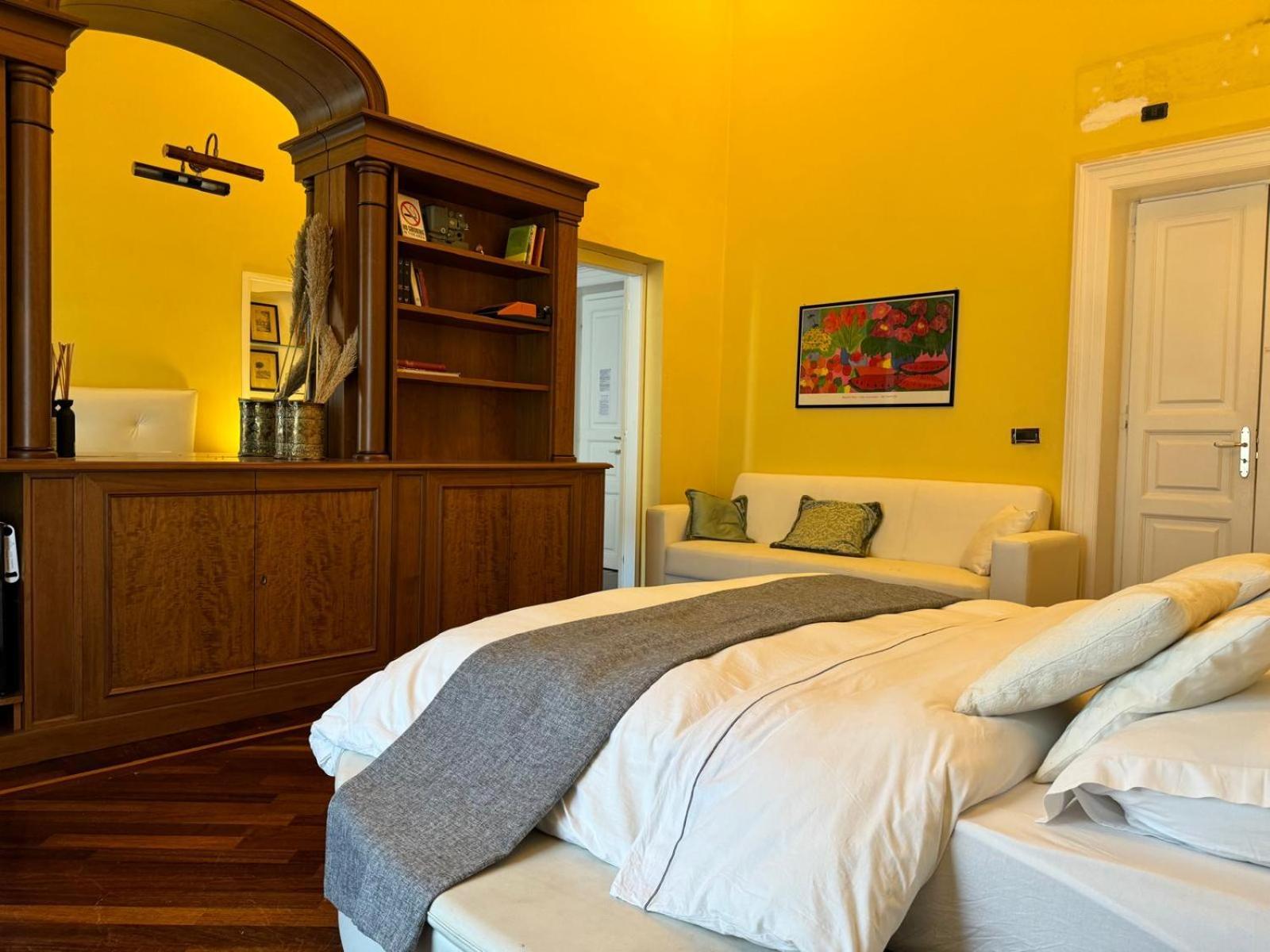 queen 24 Tarento Habitación foto